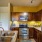 Galley kitchen with sink in island