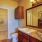 Large ensuite bath with single vanity and walk in closet in bath