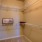 Large walk in closet with wire shelving and hangers